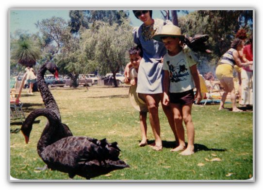 Young Mum DJ and CJ looking at swan